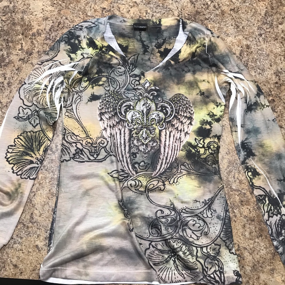 Long sleeved Daytrip brand shirt. Size large